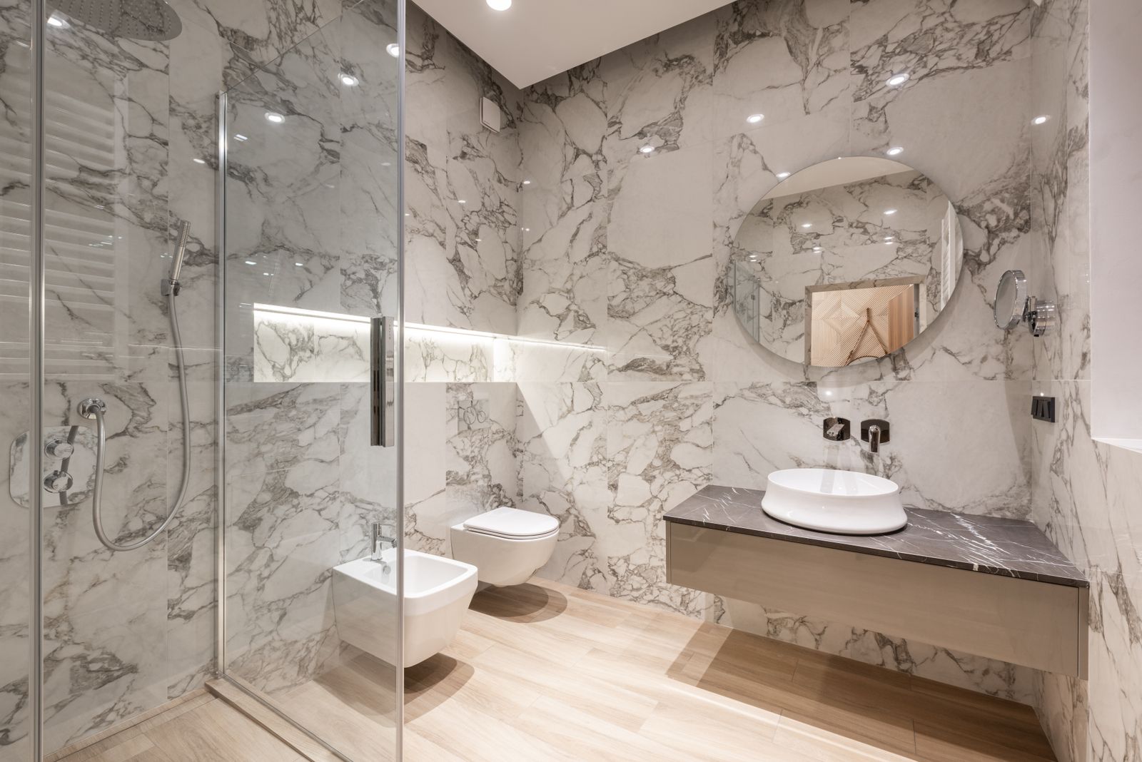 Accessible bathroom with barrier-free shower, comfort-height toilet and support bars